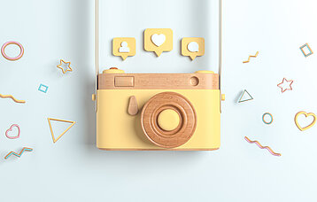 Kamera mit Instagram-Symbolen