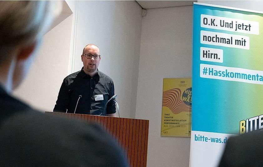 Dr. Thomas Junge bei einer Veranstaltung der Kampagne Bitte was