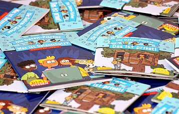 Man sieht mehrere Pixi Bücher aus der Reihe"Die Datenfüchse"