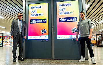 Personen bei einer Veranstaltung der Kampagne Bitte was in der Klettpassage