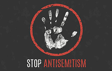 Weißer Handabdruck mit rotem rundem Rand mit der Aufschrift Stop Antisemitism